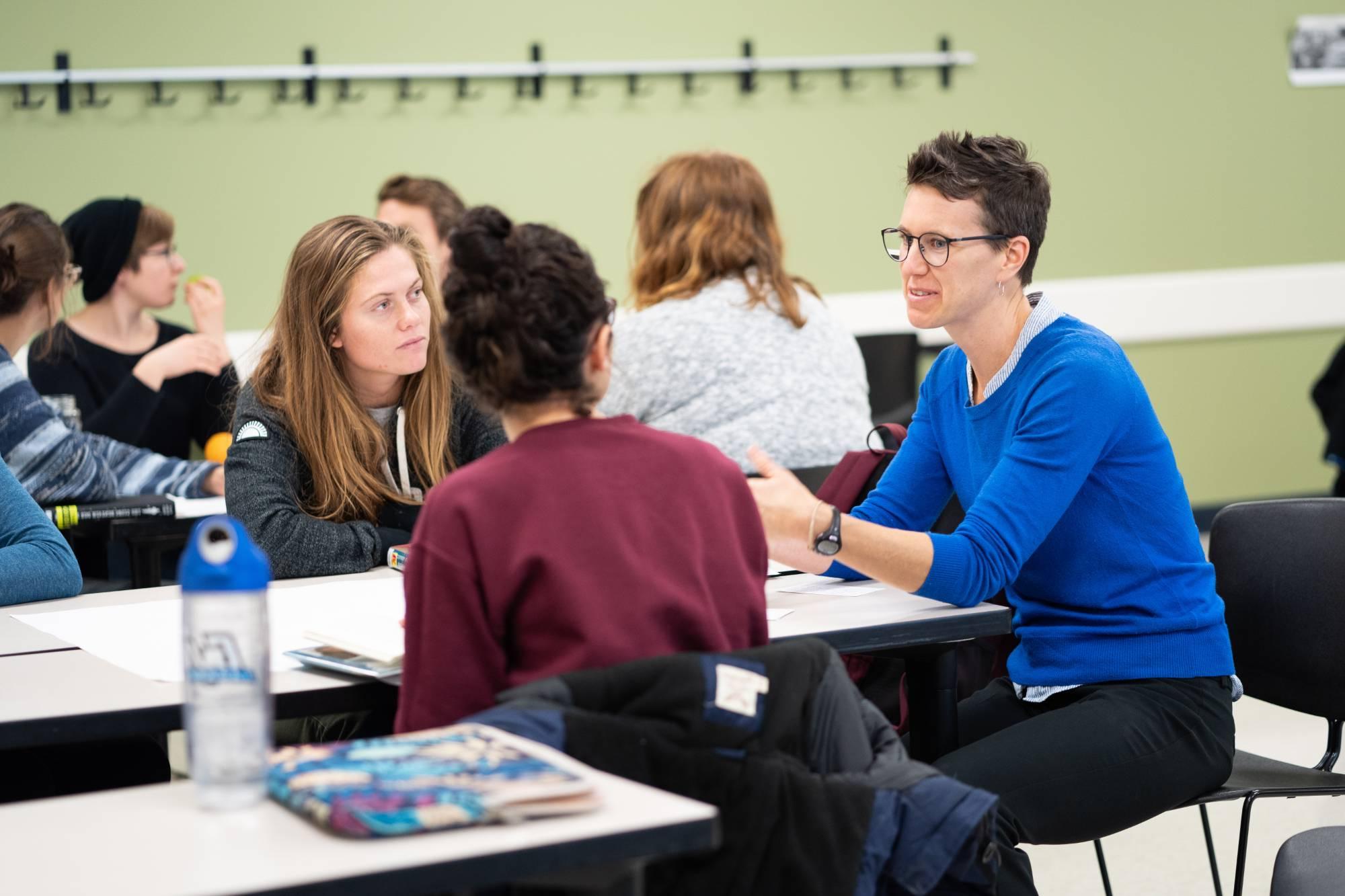 MI Intercollegiate Program students meeting in a small group